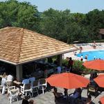 Juperana Gold granite honed performs at Geneva Ridge outdoor bar.